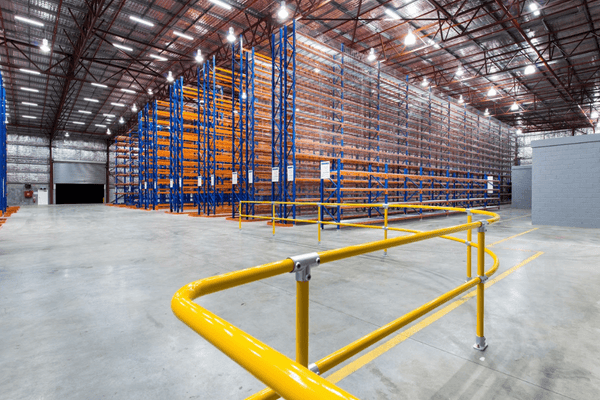 Warehouse safety setup with line marking and barriers Warehouse safety setup with line marking and barriers